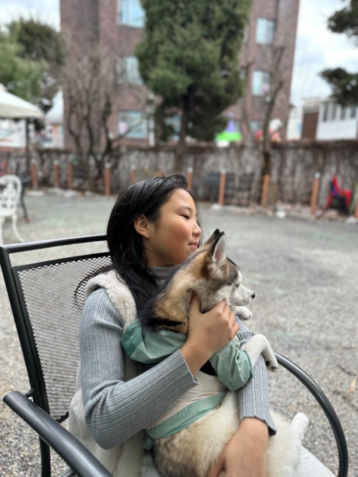 Lykke with a happy husky